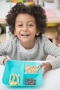 Boy with Kiddiebites Teal Silicone Plate