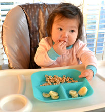 Load image into Gallery viewer, Baby in high chair with Kiddiebites Teal Silicone Plate